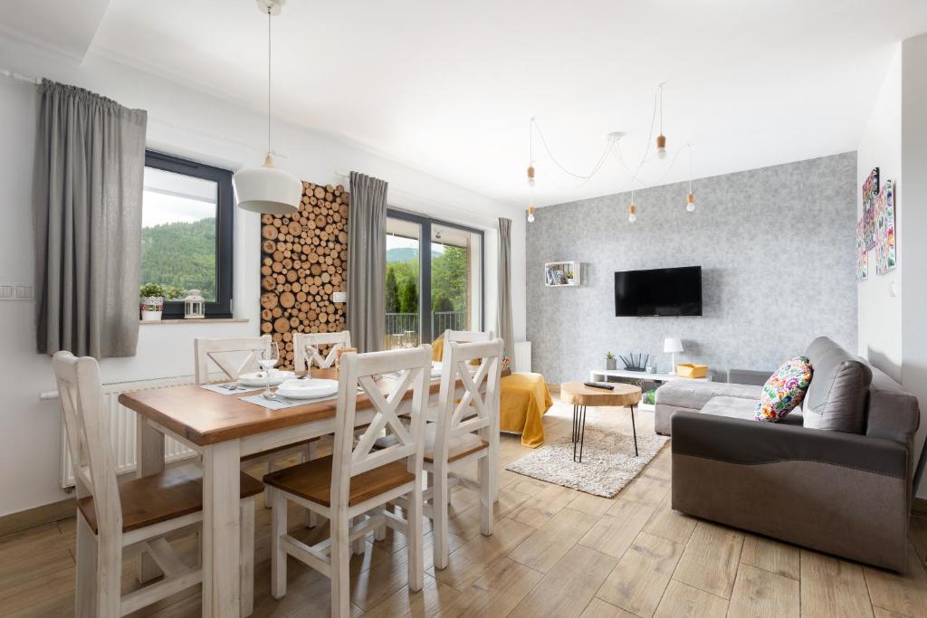Televízia a/alebo spoločenská miestnosť v ubytovaní APARTAMENT8 Wellness Sauna View 5os