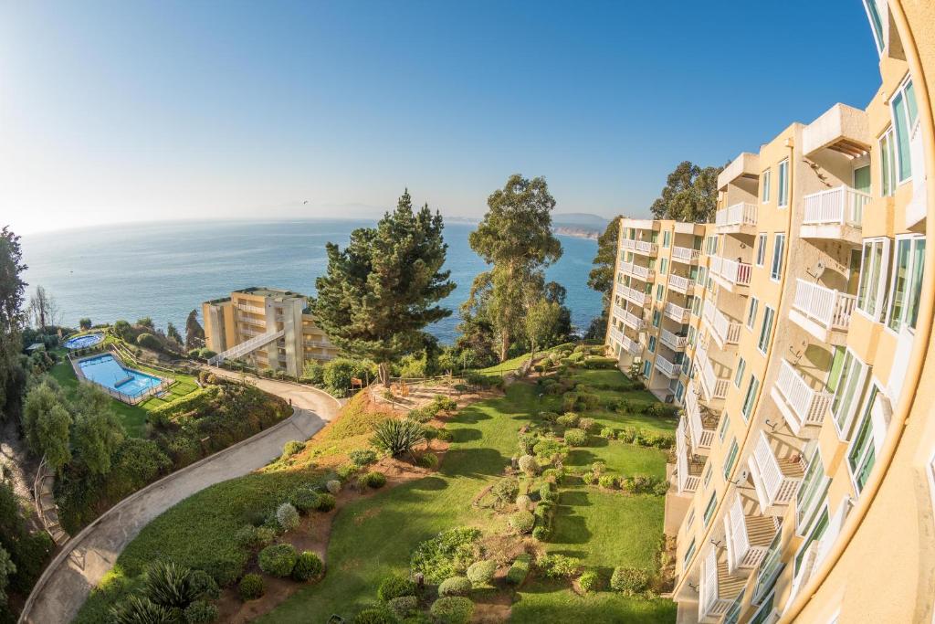 a view from the balcony of a apartment building at Oceana Suites Bahia Pelicanos in Puchuncaví