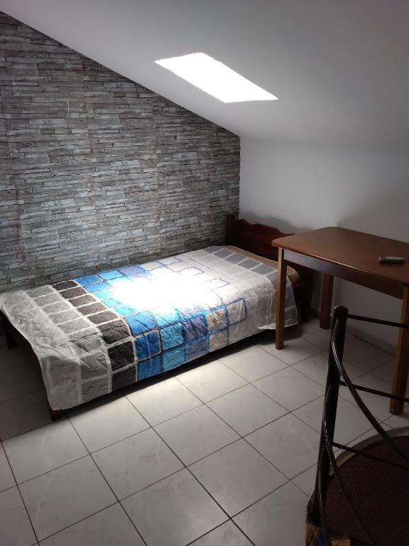 Postel nebo postele na pokoji v ubytování Apartments Gregory & George