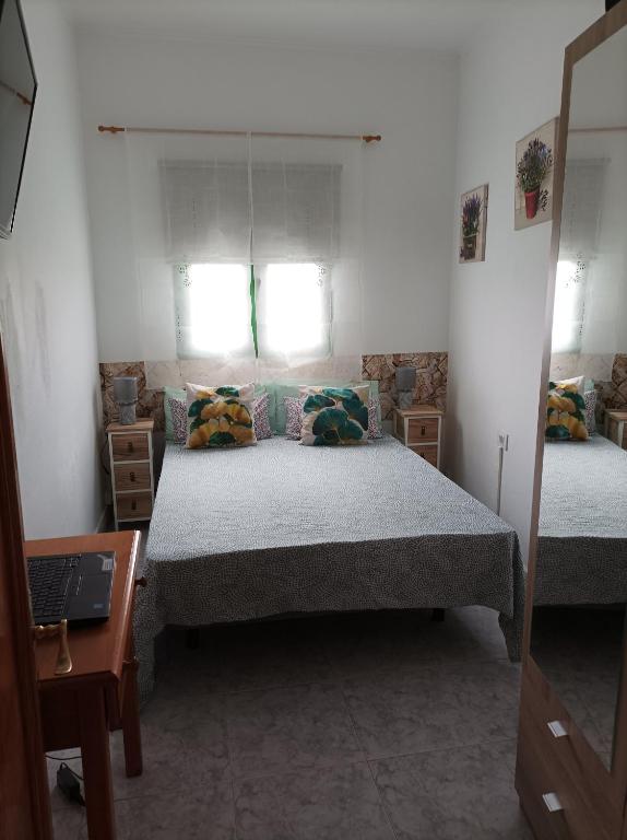Posteľ alebo postele v izbe v ubytovaní Casa Antonia Reyes, a la sombra de Famara