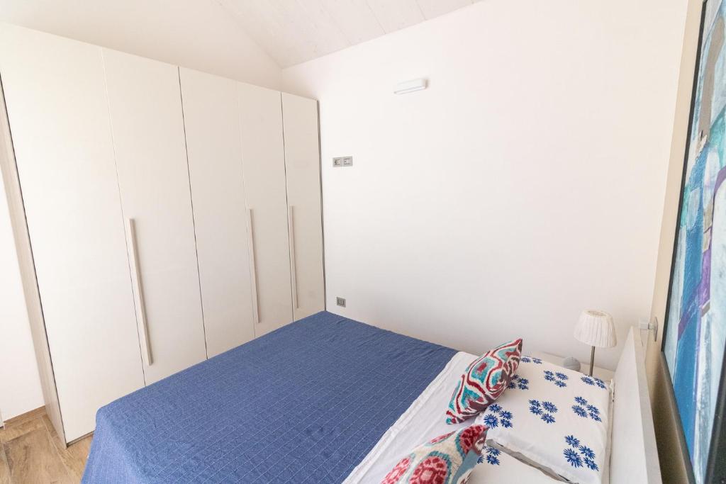 Postel nebo postele na pokoji v ubytování Suite Frida Rimini