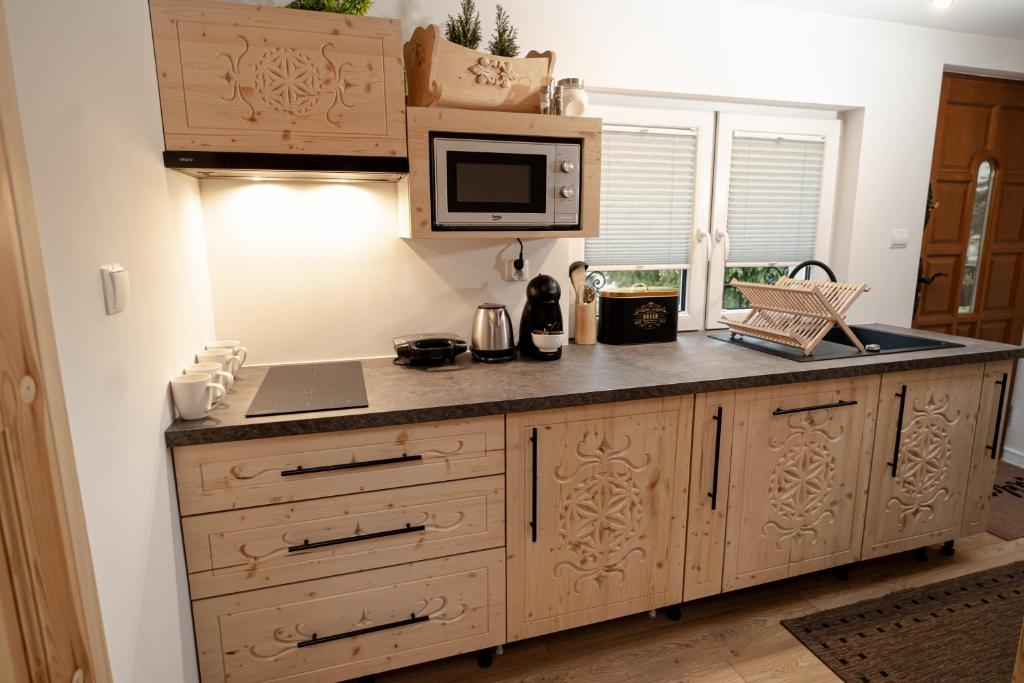 Kuchyňa alebo kuchynka v ubytovaní Podhalańska Ostoja Apartament