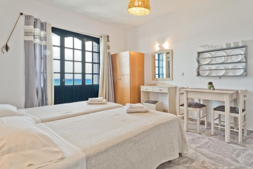 Posteľ alebo postele v izbe v ubytovaní Aegean Sea