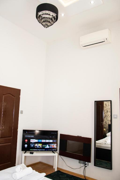 TV a/nebo společenská místnost v ubytování Andrassy Room