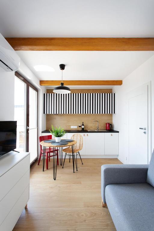 Kuchyňa alebo kuchynka v ubytovaní Szumiwoda Apartamenty Kuźnica