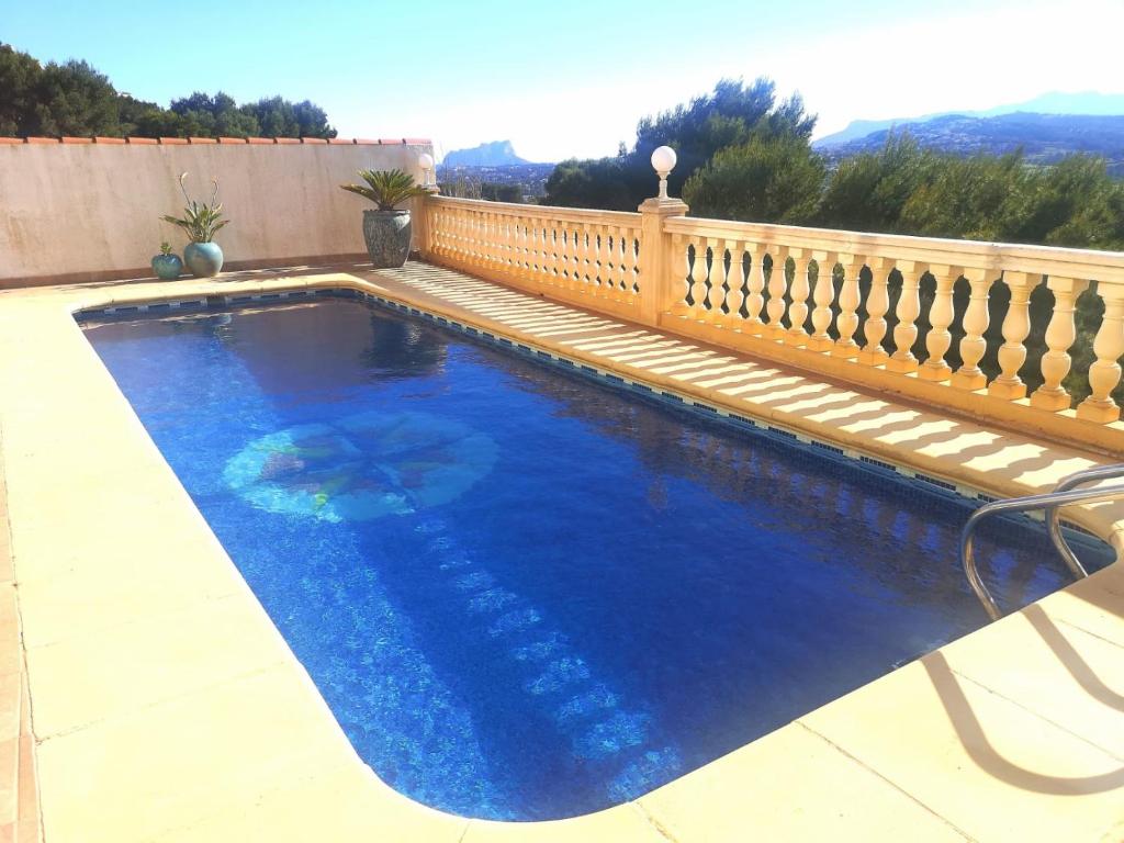 The swimming pool at or close to Casa Karma - Villa with private pool and views