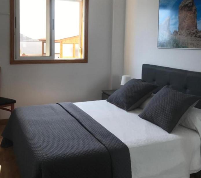 A bed or beds in a room at Apartamento mirador del Mar