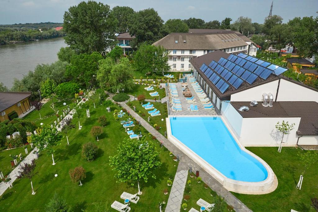 an aerial view of a resort with a swimming pool at Lebada Luxury Resort & Spa in Crisan