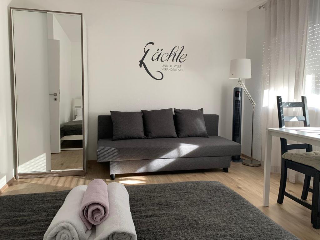 Posezení v ubytování Top Modernes 1-Zimmer-Apartment mit Küche, Parkplatz, kostenfreiem WLAN und Netflix
