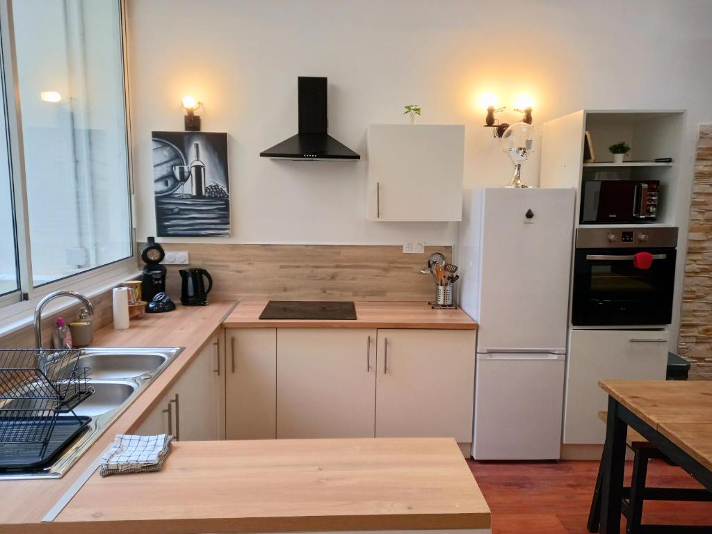 Kuchyň nebo kuchyňský kout v ubytování T5 L'ATELIER