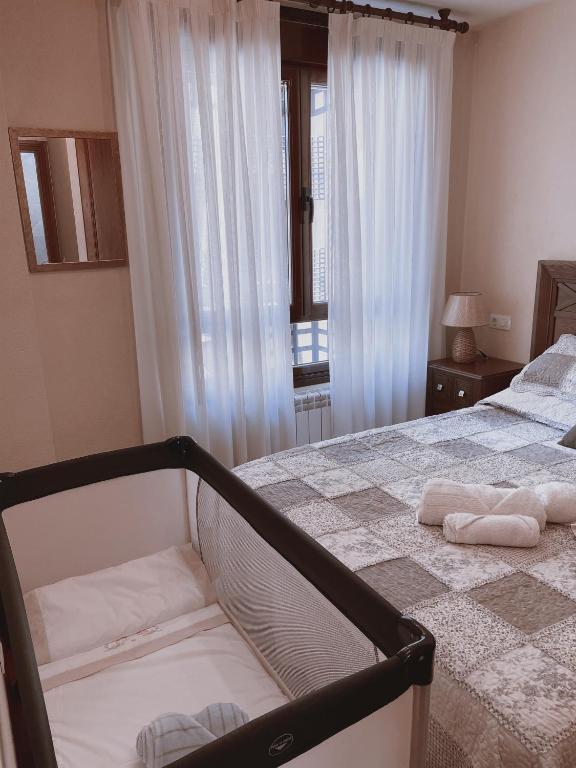 Postel nebo postele na pokoji v ubytování Camino al Cuera