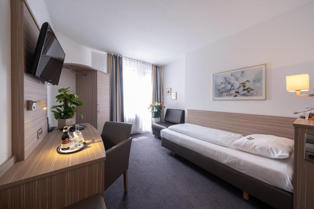 Postel nebo postele na pokoji v ubytování Hotel Bär
