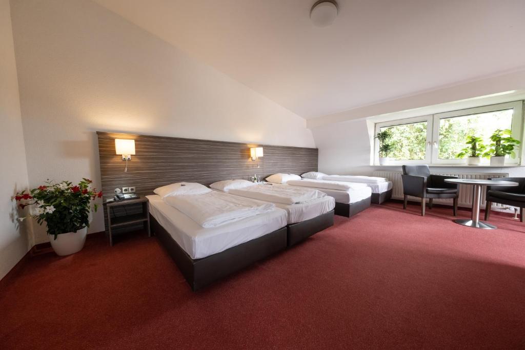 Postel nebo postele na pokoji v ubytování Hotel Bär