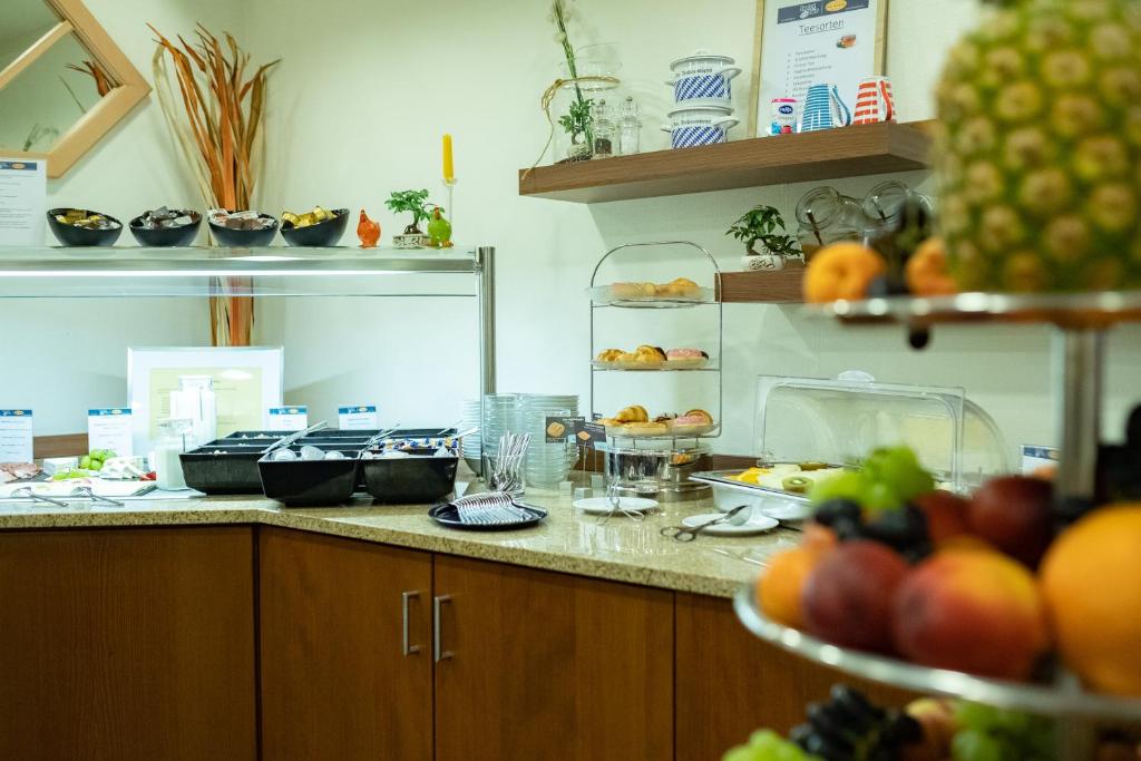 Kuchyň nebo kuchyňský kout v ubytování Hotel Bär