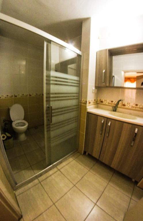 Koupelna v ubytování Kartel Hotel