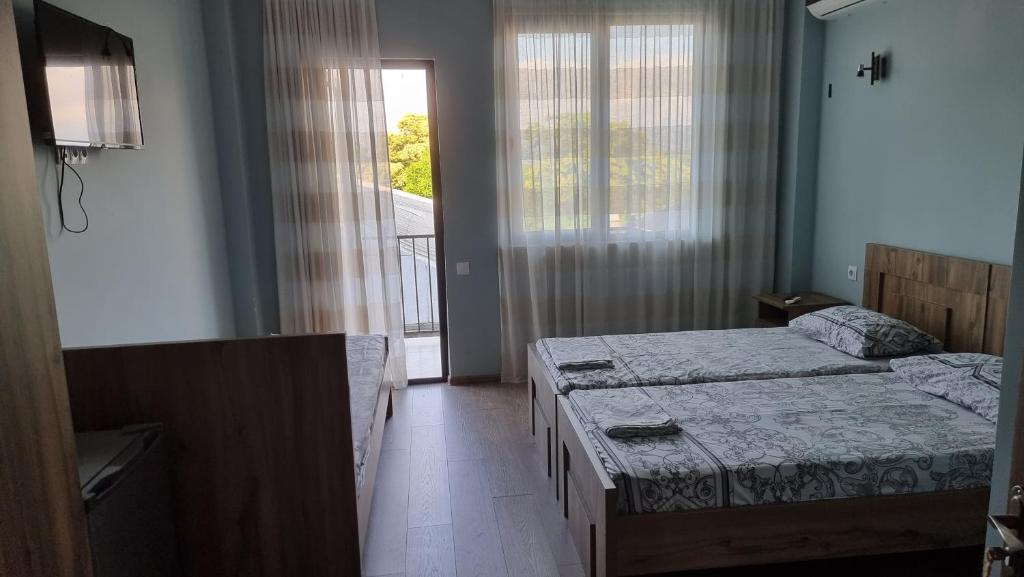 Llit o llits en una habitació de French Hotel