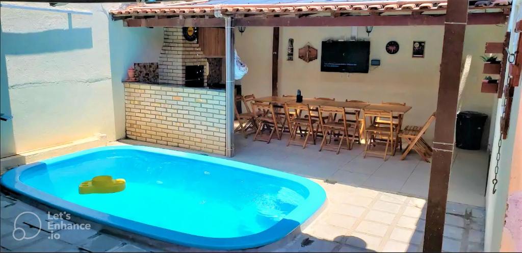 a swimming pool in the backyard of a house at Casa Campina Grande-PB Internet 500MB, Netflix, Ar in Campina Grande