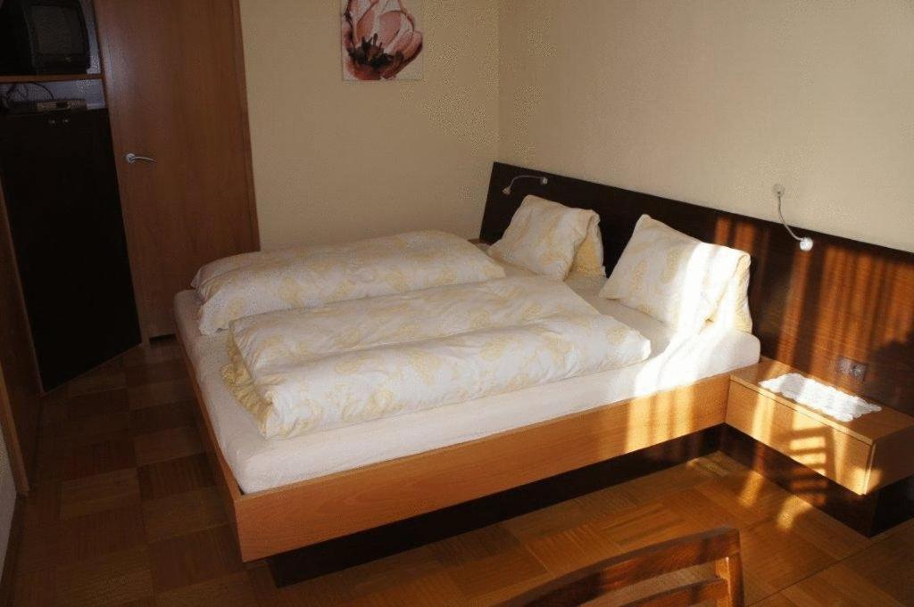Postel nebo postele na pokoji v ubytování Gasthof Bauer