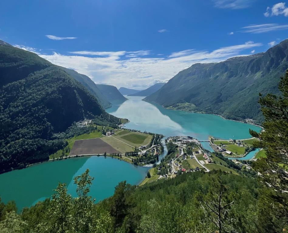 an aerial view of a lake in the mountains at Eide gard in Skjolden