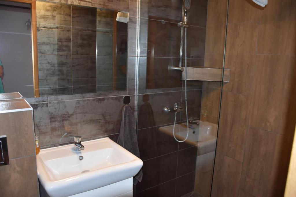 Kúpeľňa v ubytovaní Gosciniec Pod Debem