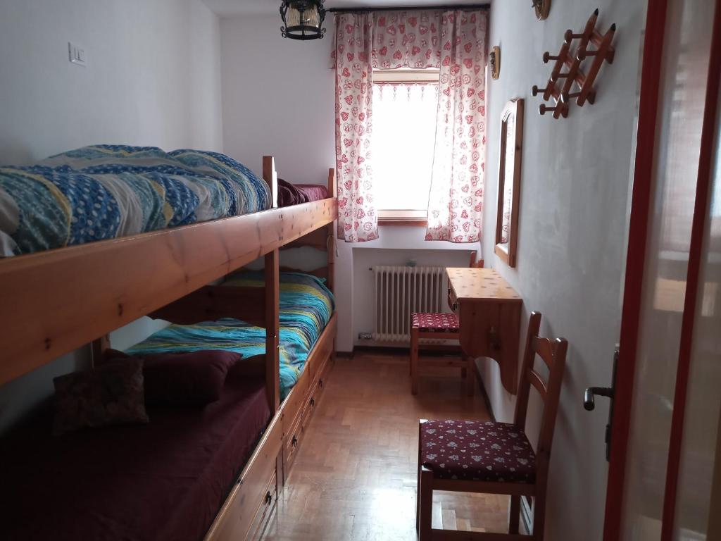 A bed or beds in a room at Stellalpina