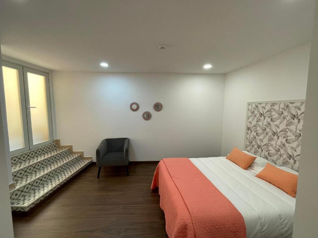 Postel nebo postele na pokoji v ubytování Concept Guest House