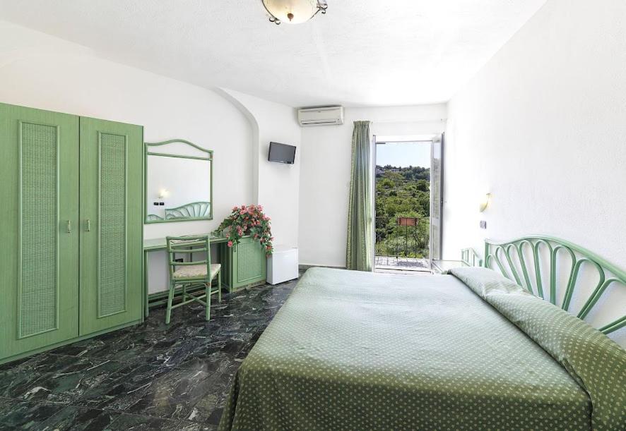 Postel nebo postele na pokoji v ubytování B&B Verde