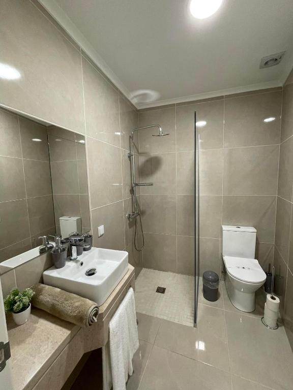 Koupelna v ubytování Concept Guest House