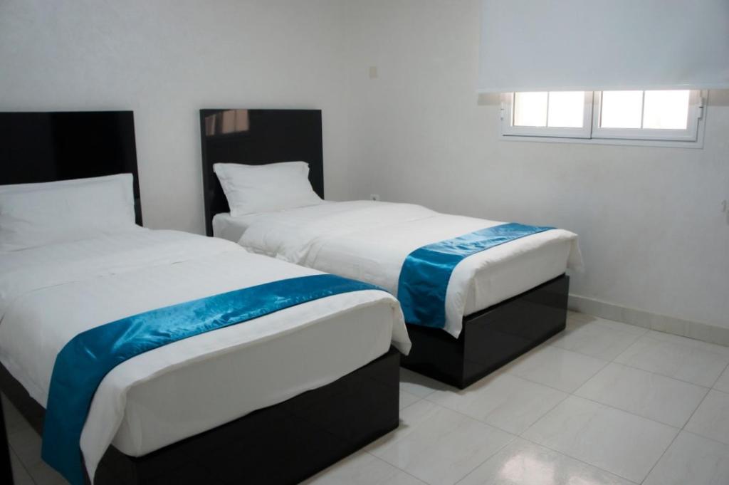 Postel nebo postele na pokoji v ubytování Valencia Hôtel & Appartements