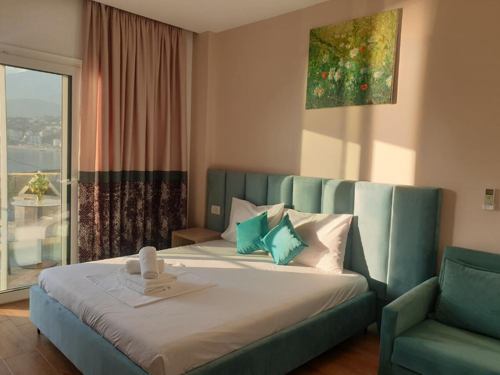 Postel nebo postele na pokoji v ubytování Seaside Hotel