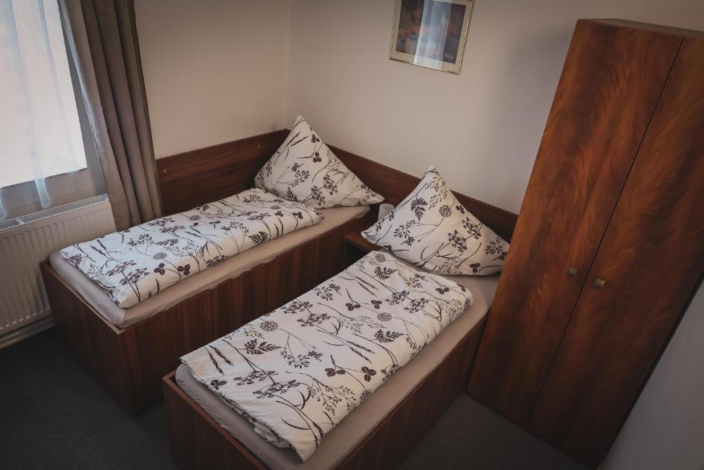 Letto o letti in una camera di Hotel Apartment Faraon