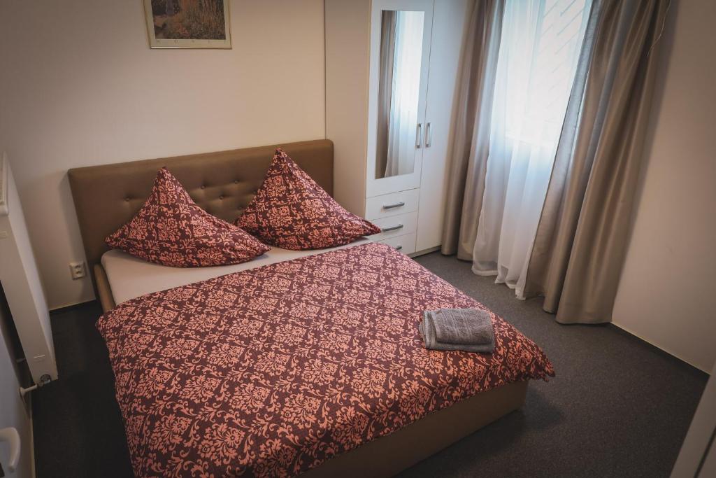 Letto o letti in una camera di Hotel Apartment Faraon