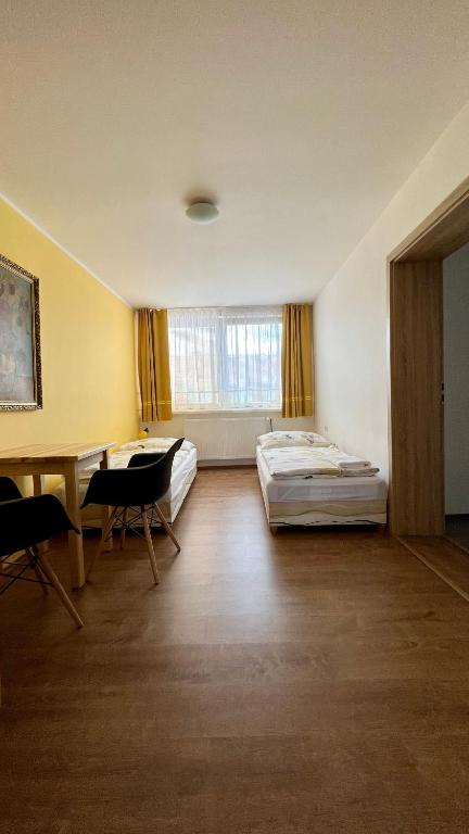 Postel nebo postele na pokoji v ubytování Ubytování Lednice