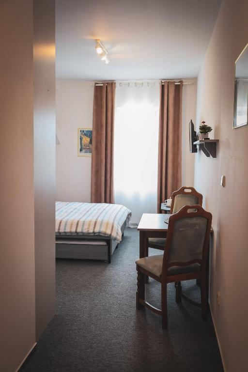 Letto o letti in una camera di Hotel Apartment Faraon