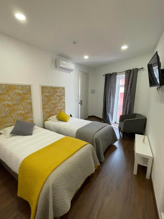 Postel nebo postele na pokoji v ubytování Concept Guest House