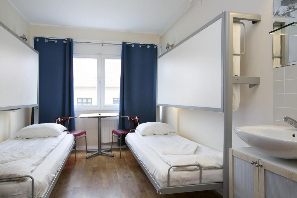 Postel nebo postele na pokoji v ubytování Hotel Copenhagen