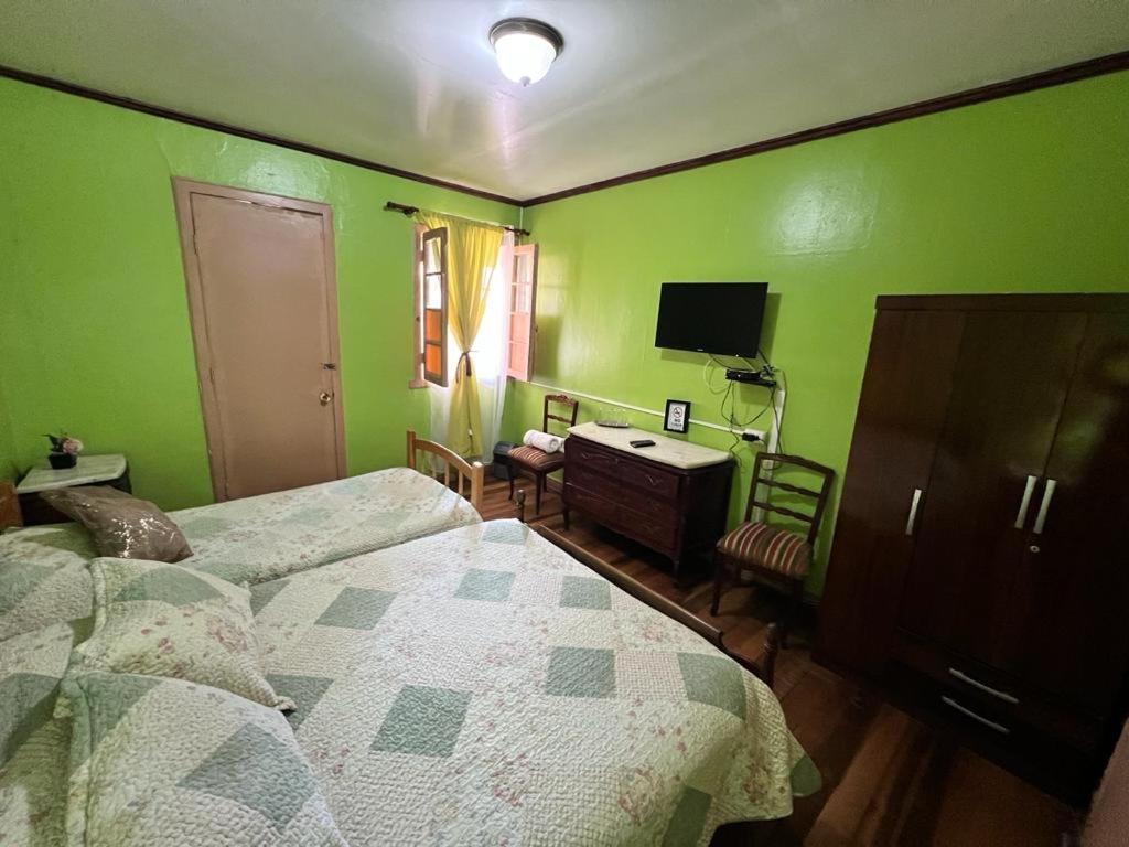 Postel nebo postele na pokoji v ubytování Residencial Campo Verde