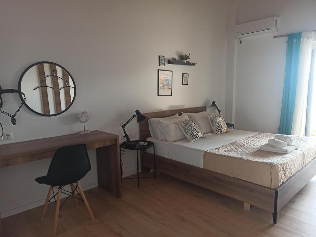 Uma cama ou camas num quarto em Bourbos Summer Rooms