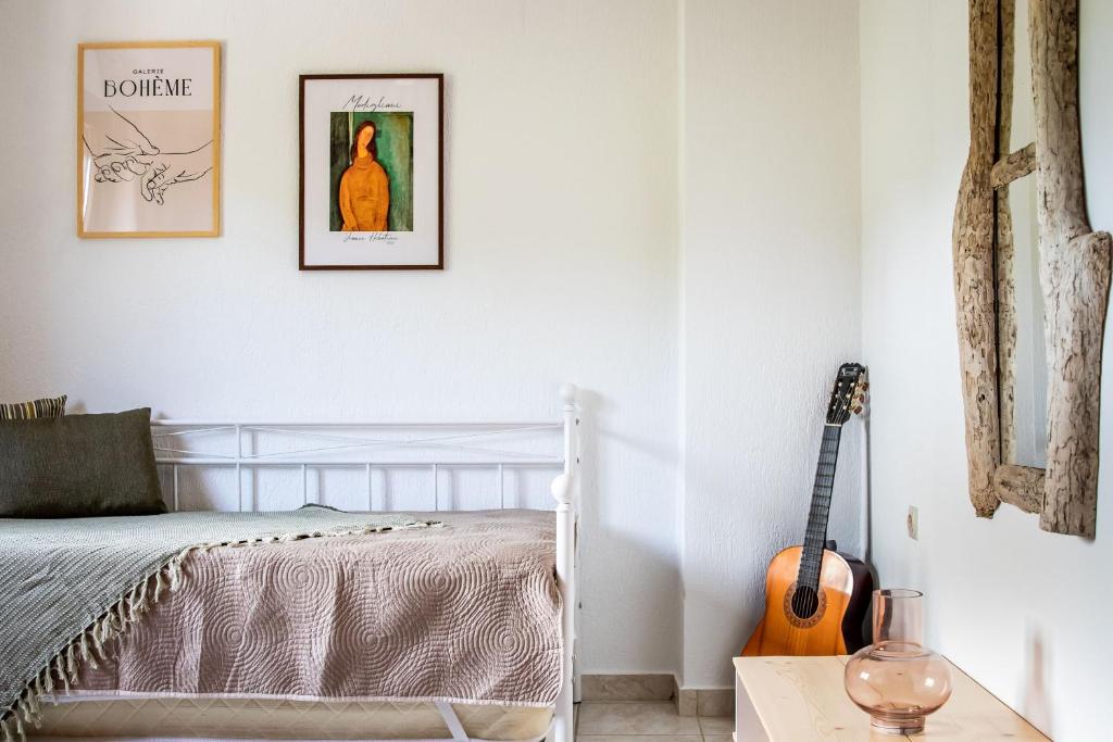 Postel nebo postele na pokoji v ubytování Giasemi Apartments