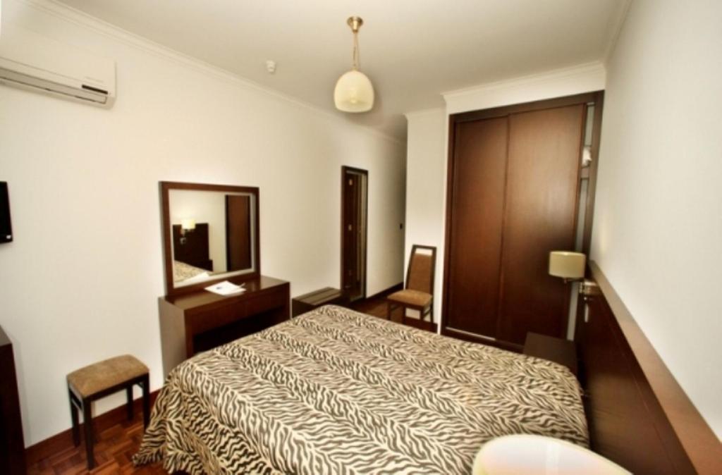 Postel nebo postele na pokoji v ubytování Hotel Mira Rio