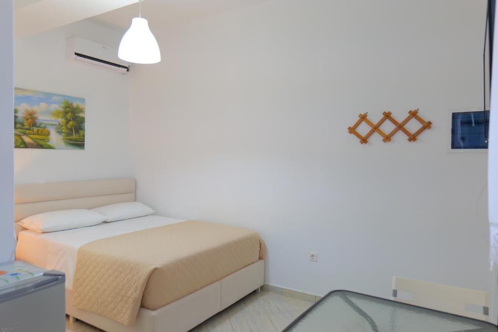 Postel nebo postele na pokoji v ubytování Sunset villas