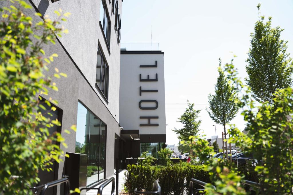 a building with a sign that reads hotel at GREFIS Hotel in Munich