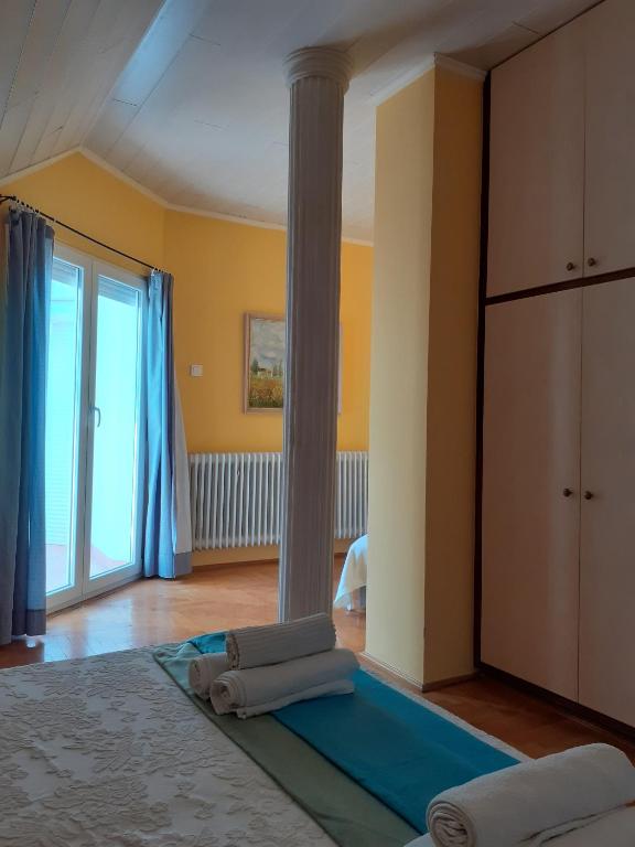Postel nebo postele na pokoji v ubytování Csopak Mariann Apartman