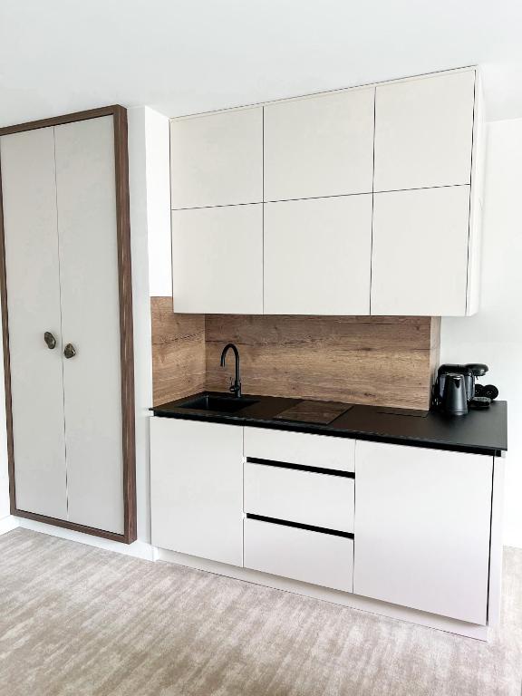 Kuchyňa alebo kuchynka v ubytovaní Apartament Morski Widok Międzyzdroje