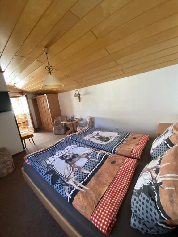 Postel nebo postele na pokoji v ubytování Tiefenbrunn