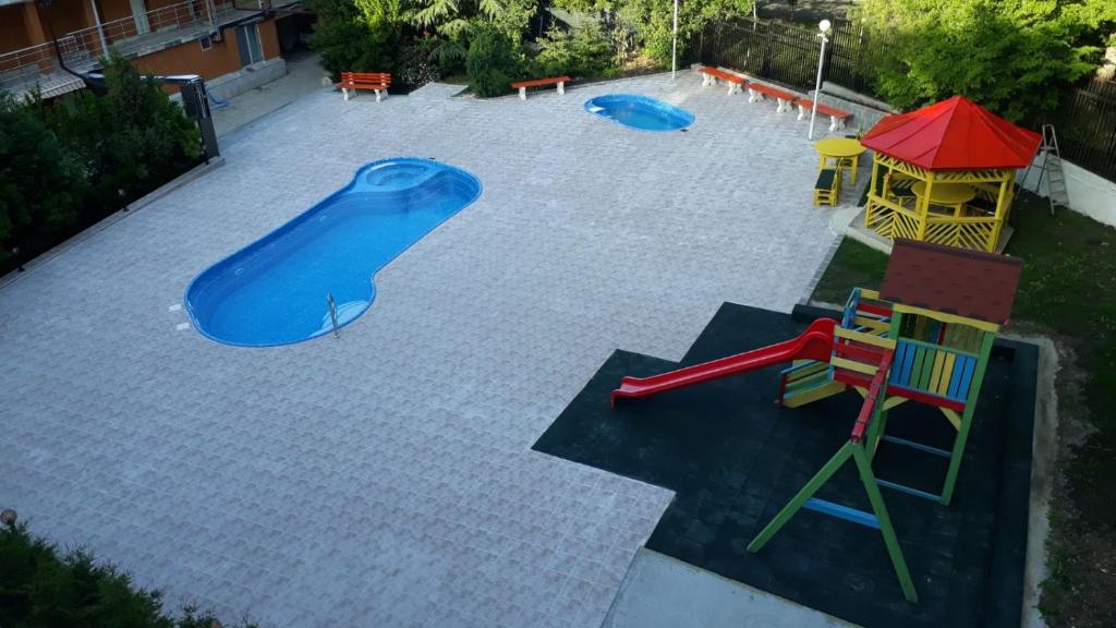 Herní místnost nebo prostor pro děti v ubytování Hotel Maria