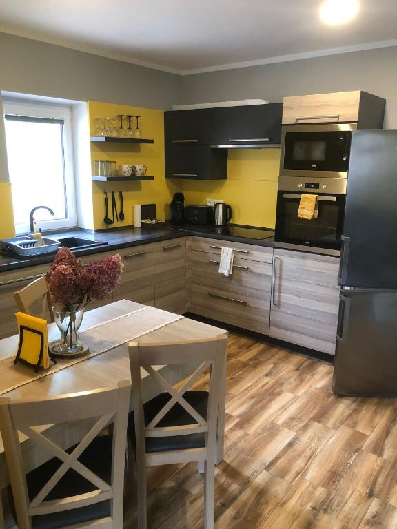 Kuchyň nebo kuchyňský kout v ubytování Apartmán Lomňanka