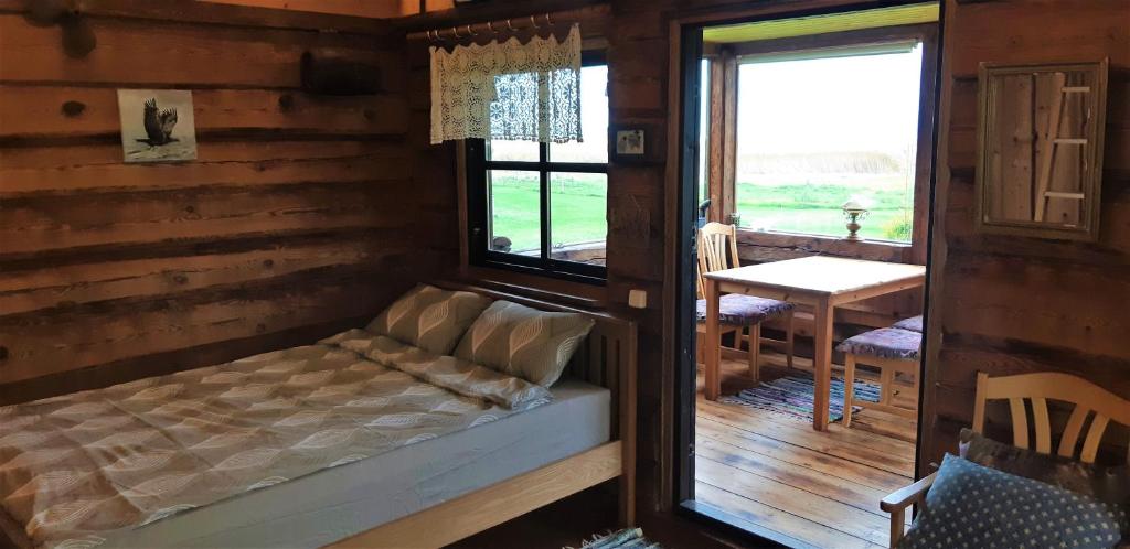 Postel nebo postele na pokoji v ubytování Saulepa Cottage