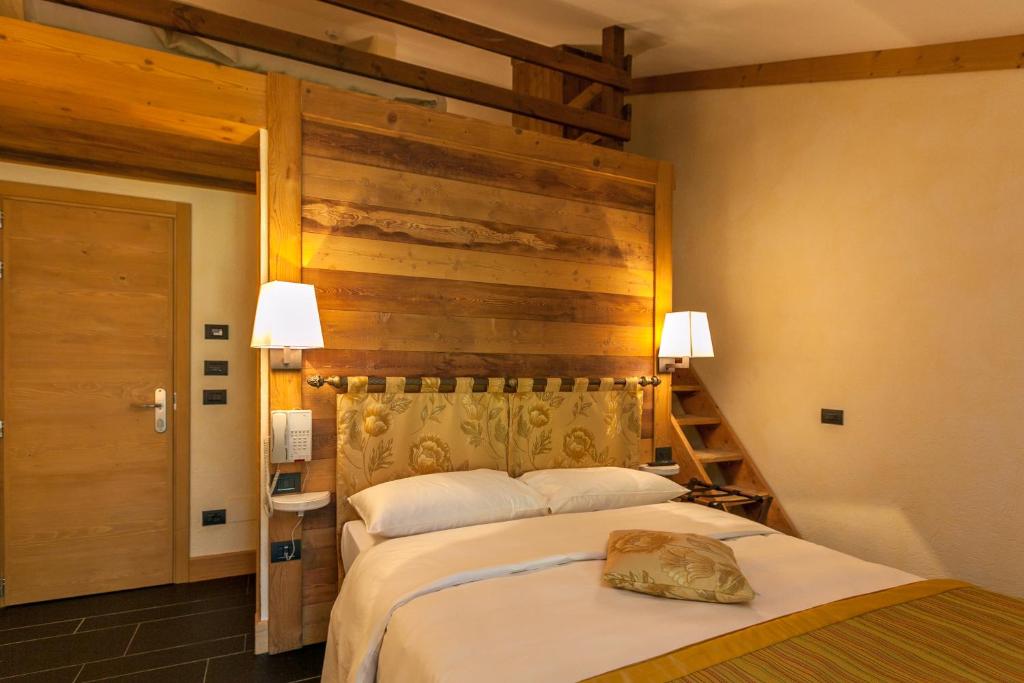 Posteľ alebo postele v izbe v ubytovaní Hotel Lo Scoiattolo