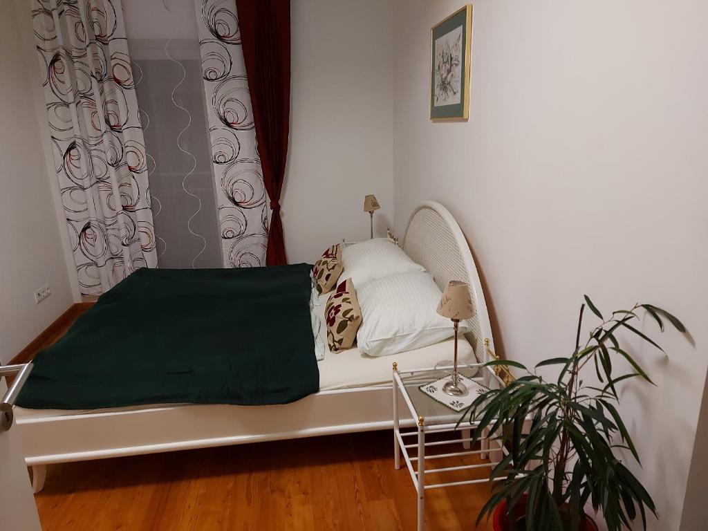 Postel nebo postele na pokoji v ubytování Schlossblick Stainz